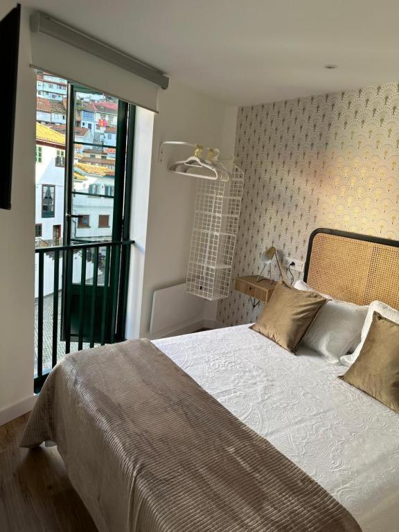 Apartamentos Urbanin II Plaza De San Pedro Кудилеро Екстериор снимка